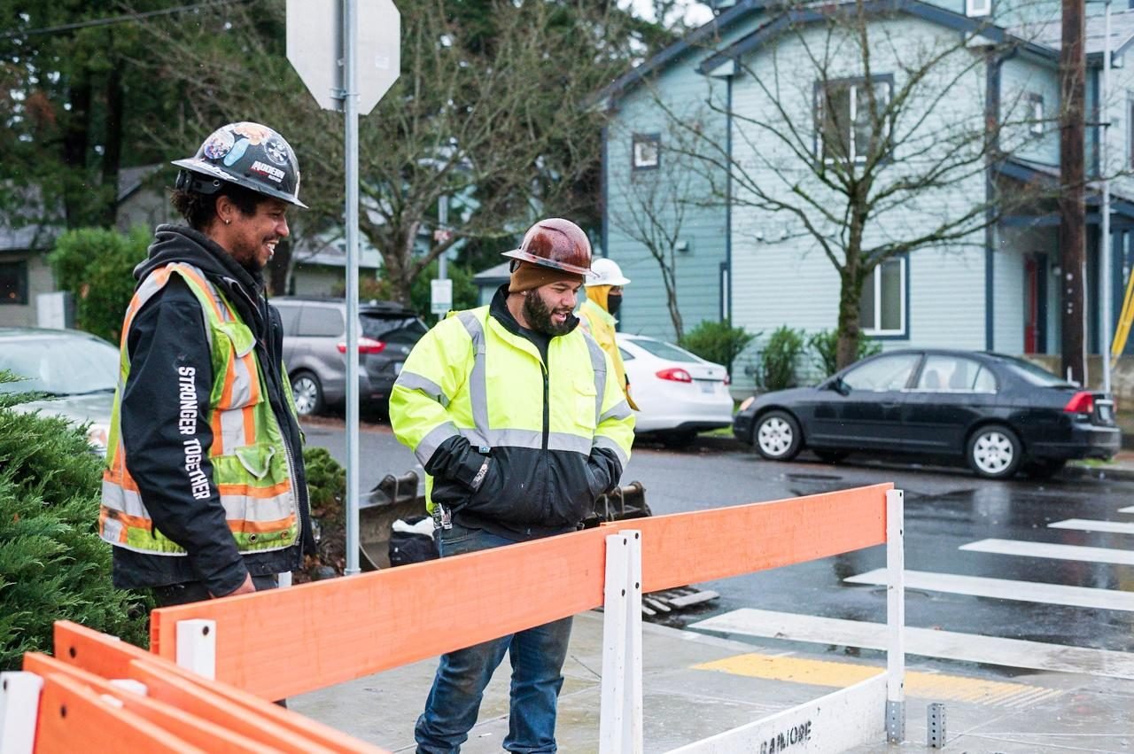 Engineers reviewing plans on site